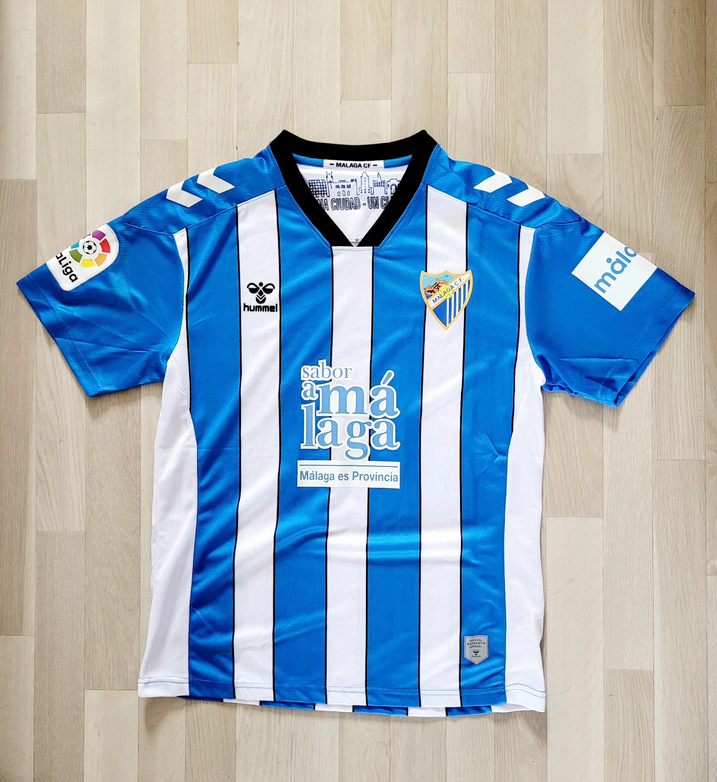 Malaga 2022-2023 Home Store Version Hummel - YourFootballShirt